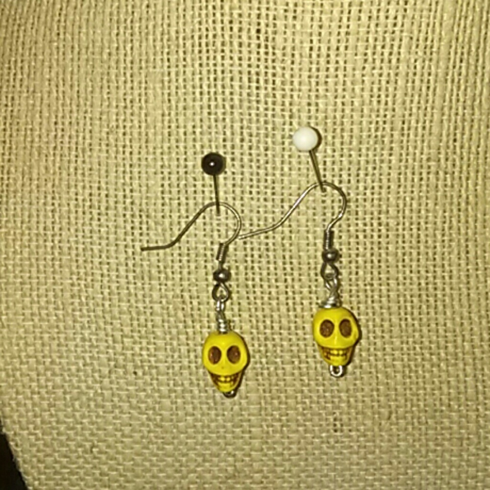 Stone yellow skull earrings silver hooks